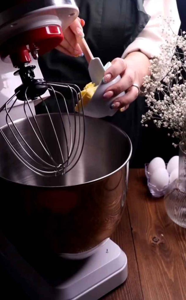 Pour the butter and sugar into a large bowl and start mixing