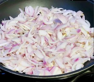 cut onion into slices and fry them