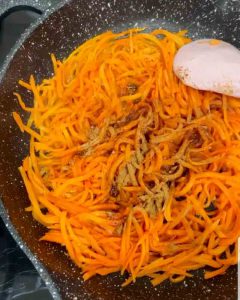 Frying carrots for khoresh havij