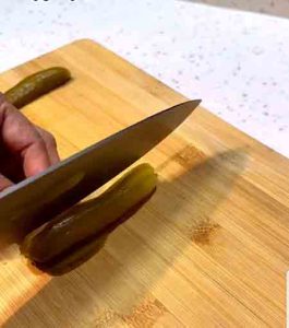 cut pickled cucumbers into small pieces