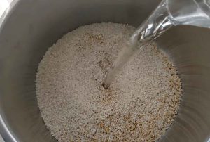 add water to the half-grain rice and wheat