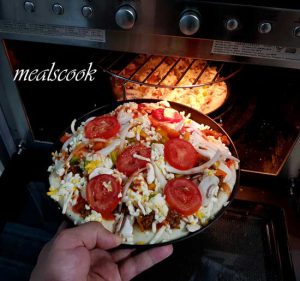 add persian pizza in oven
